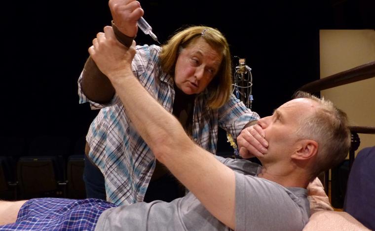 Jackie Skiles and Jonathan Grafft in the Richmond Hill Barn Theatre's Misery